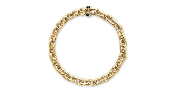 a yellow gold chain link bracelet from Miss Mimi