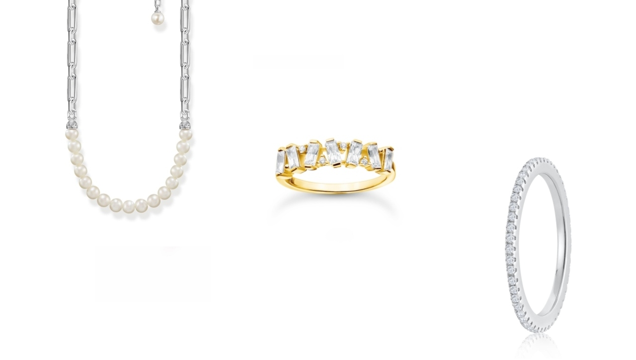 Layerable necklace and statement ring by Thomas Sabo and a stackable diamond ring by Miss Mimi