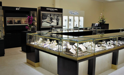A wide shot of jewellery and watch displays at Damiani Jewellers.