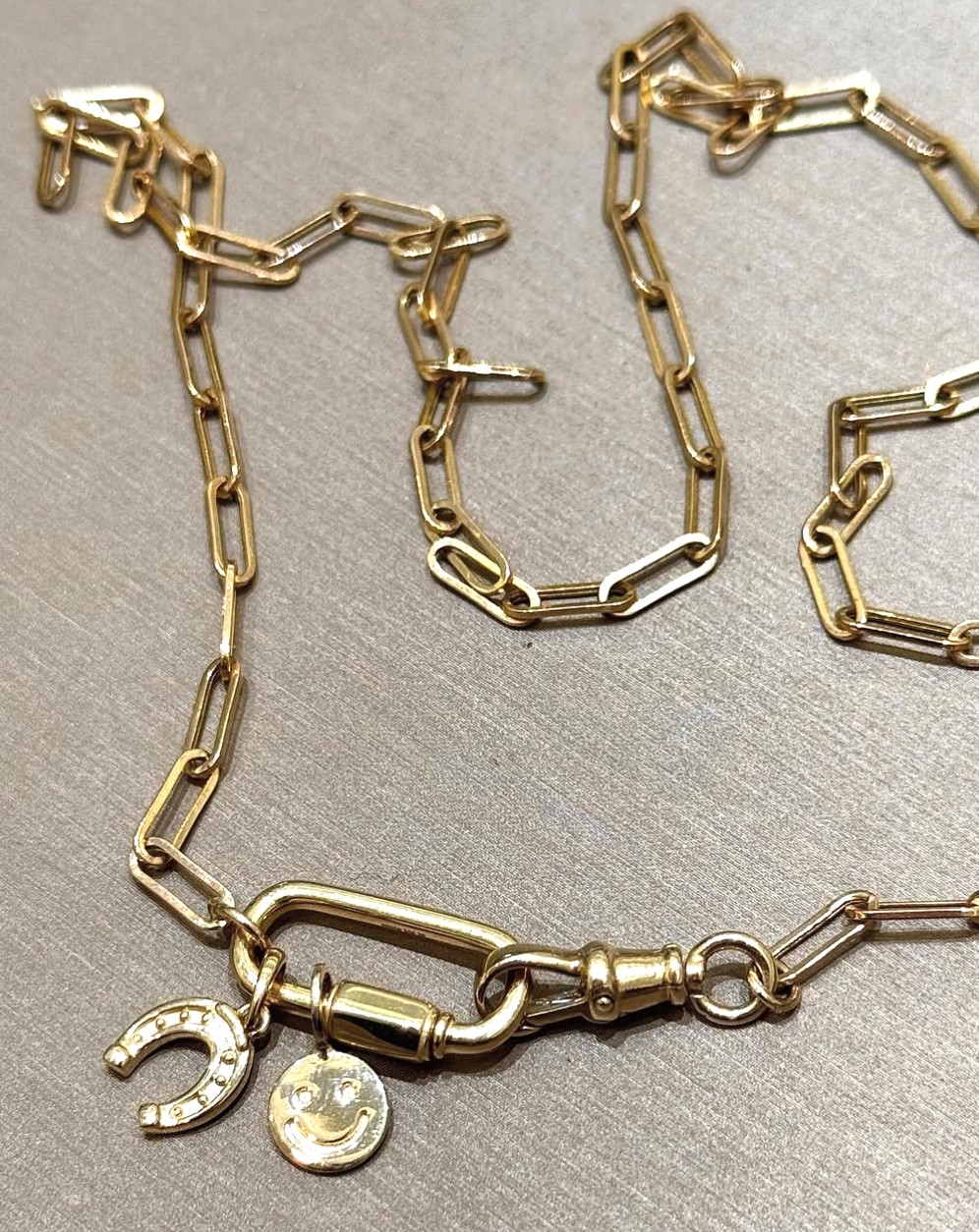 charm necklaces and bracelets available this fall at Damiani Jewellers